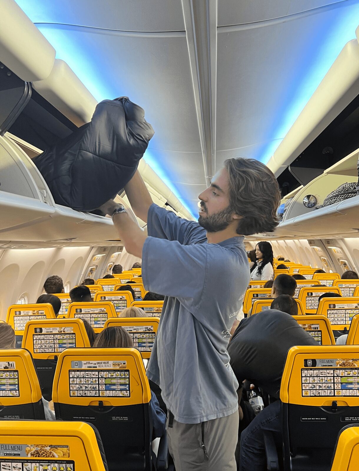 Storing the empty vest in the overhead compartment