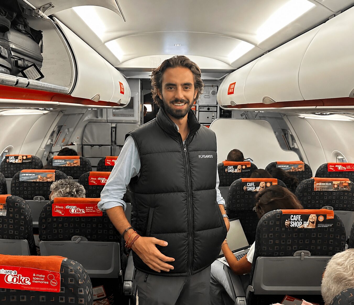 Traveler wearing the Flygaroo vest on a plane